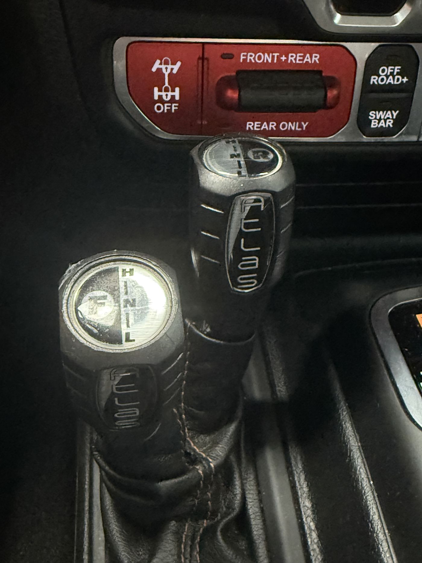 Alpine head unit displaying live engine gauges including RPM, intake temperature, fuel, and load