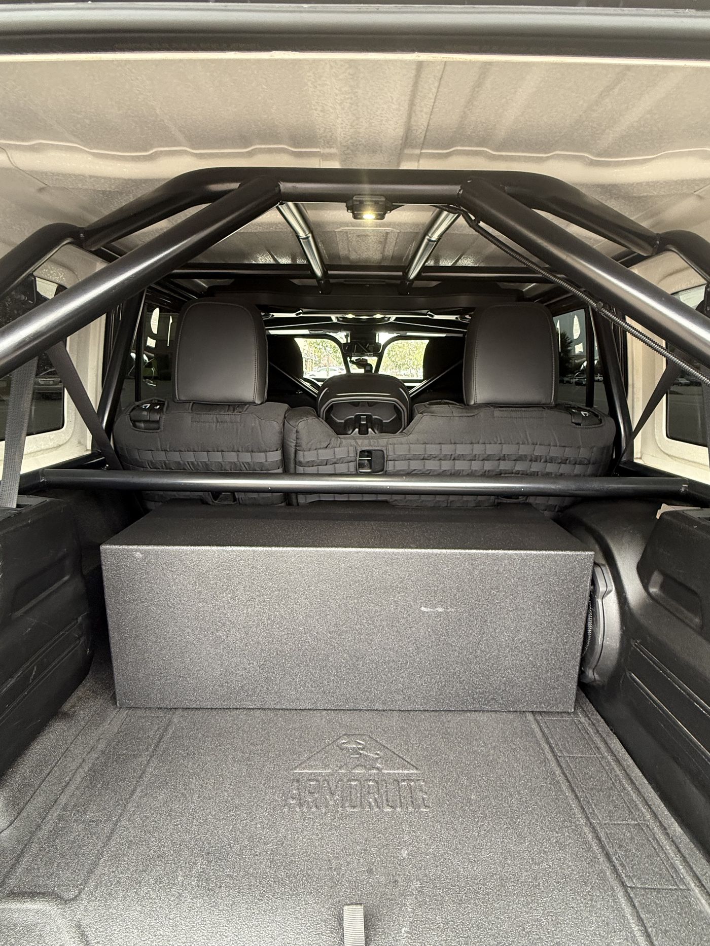 Cargo area with Armorlite flooring system and custom subwoofer enclosure