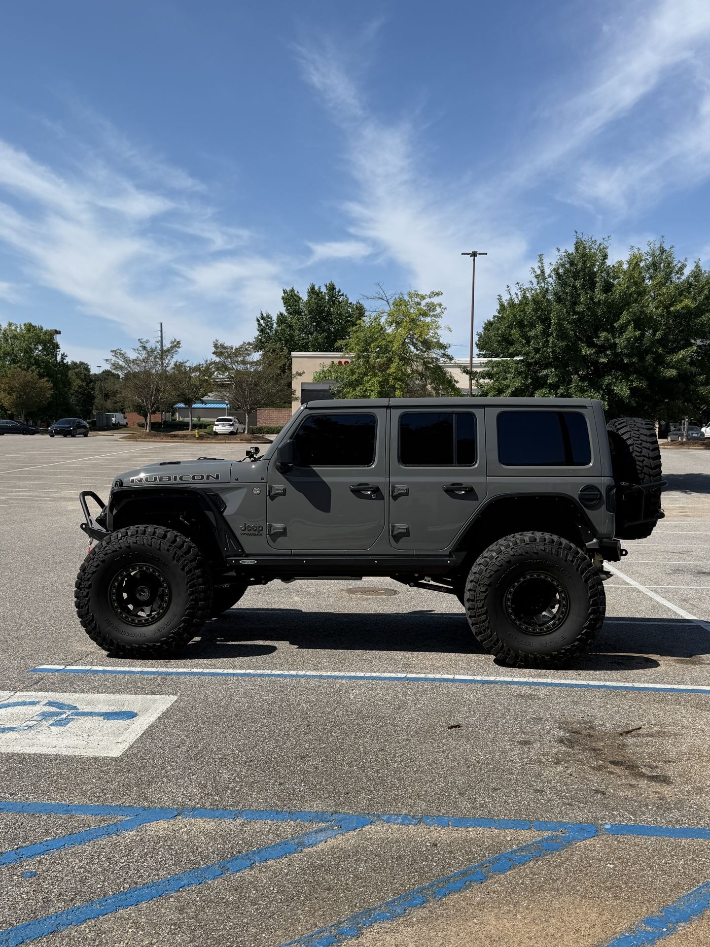 Side profile of the Jeep showing 42 inch Mickey Thompson MTs and Method beadlocks